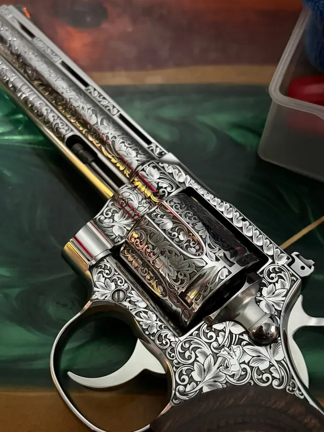 Engraved revolver barrel and cylinder with scroll pattern